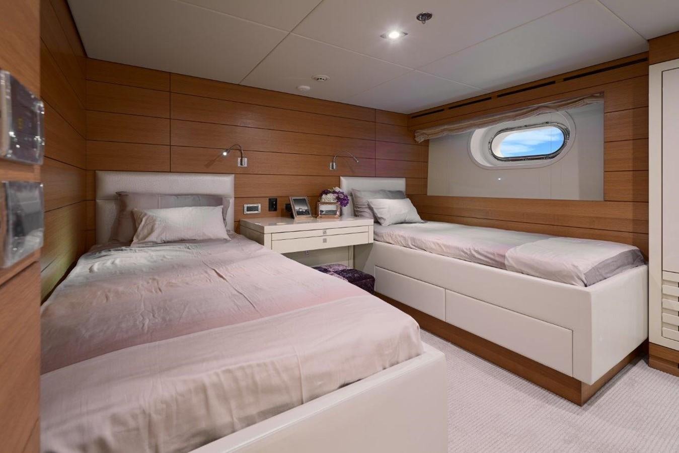 a room with two beds aboard EP150 Yacht for Sale