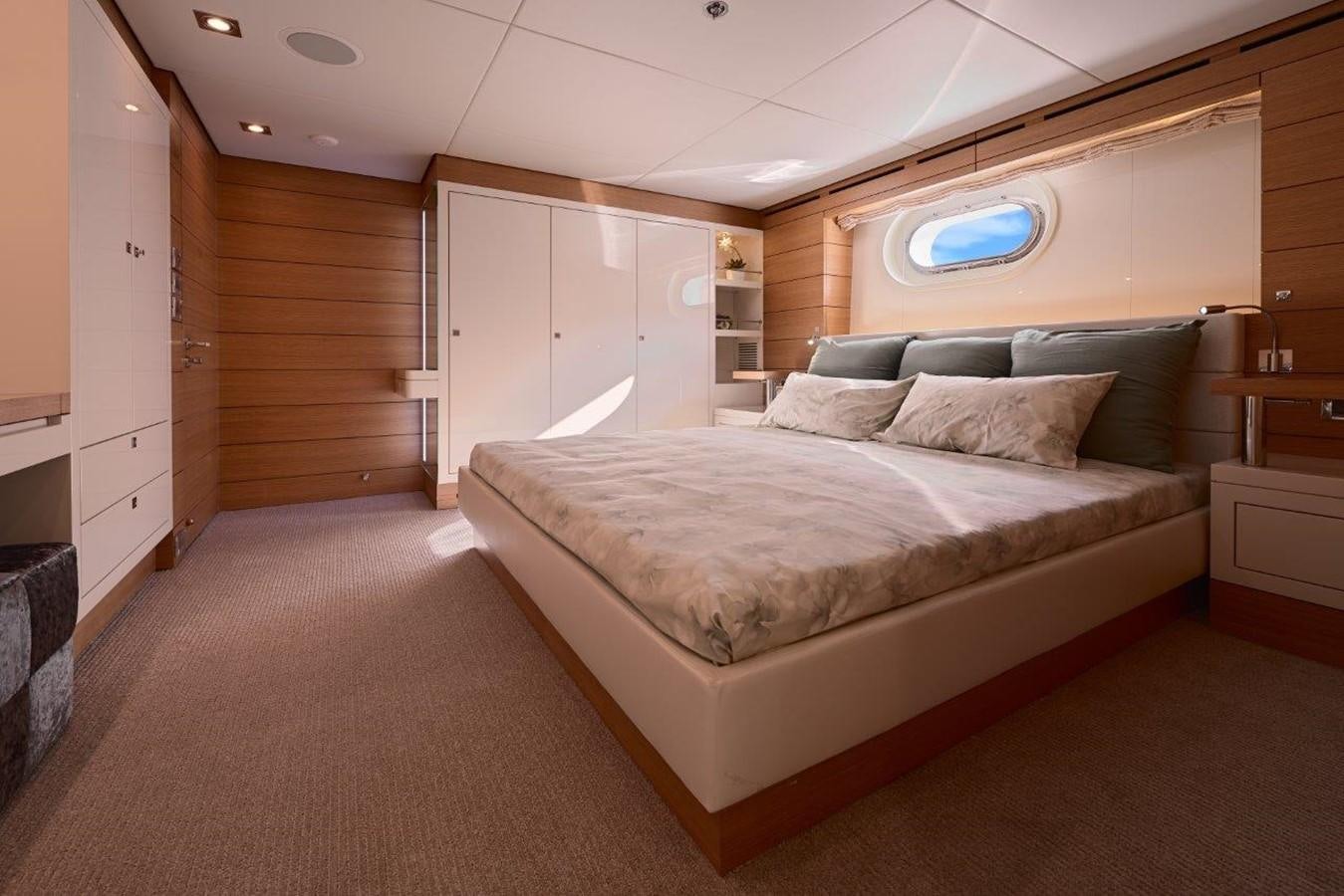 a large bed in a room aboard EP150 Yacht for Sale