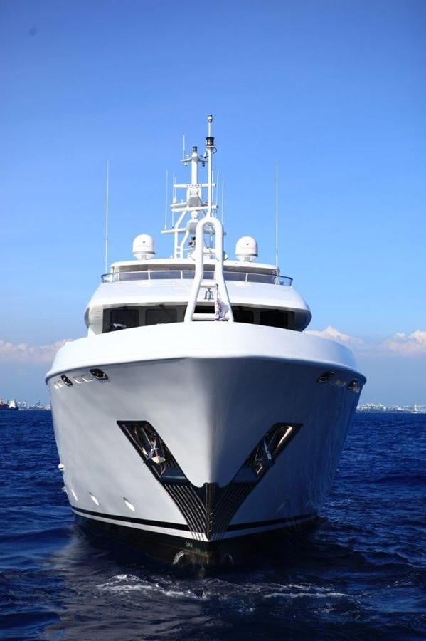 a white boat in the water aboard EP150 Yacht for Sale