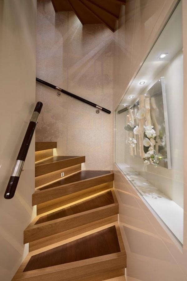 a staircase with a mirror aboard EP150 Yacht for Sale