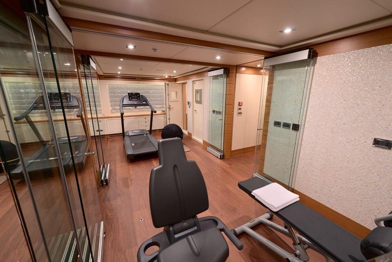 a gym with exercise equipment aboard EP150 Yacht for Sale