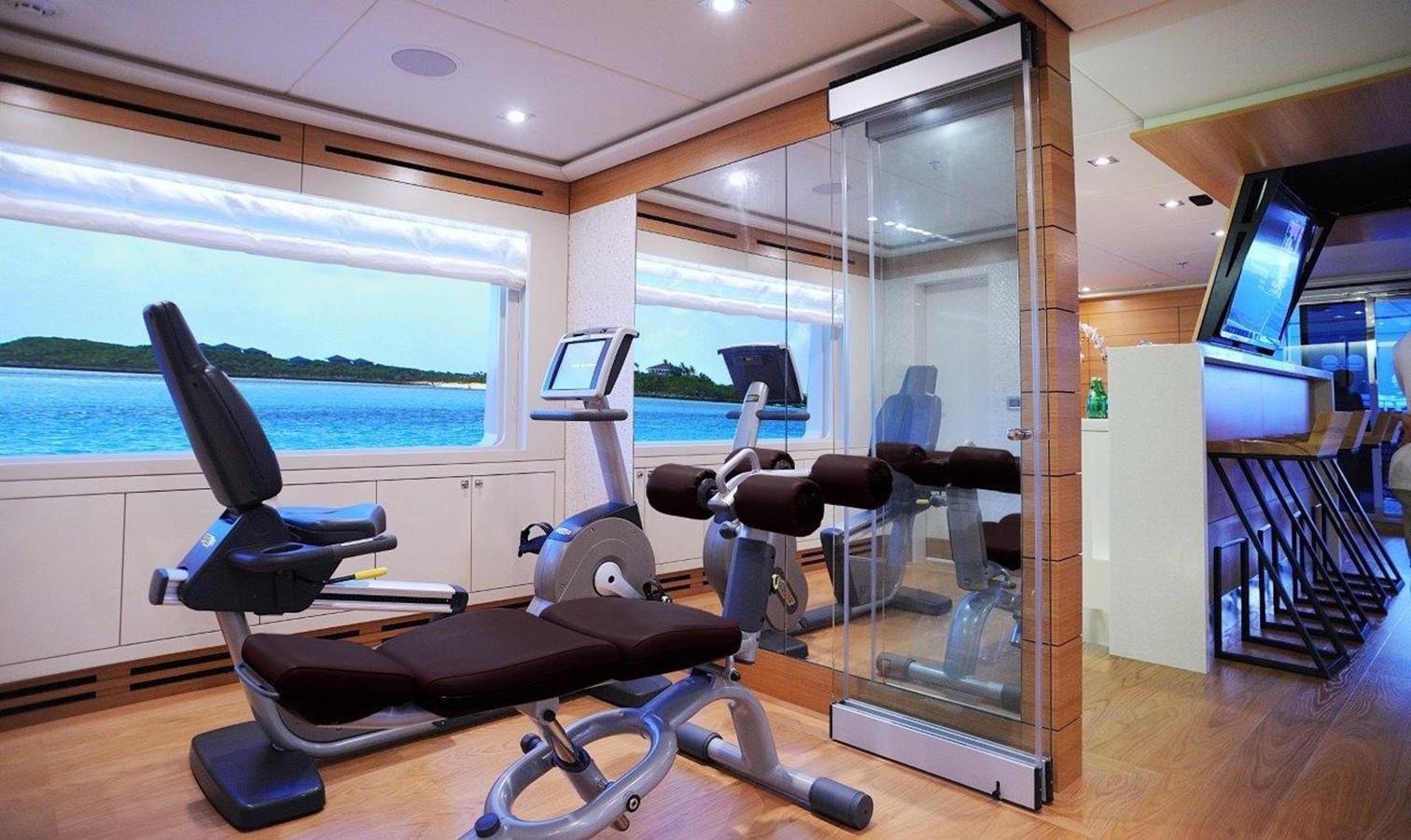 a room with treadmills and treadmills aboard EP150 Yacht for Sale