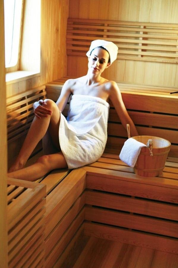 a person in a white dress aboard EP150 Yacht for Sale