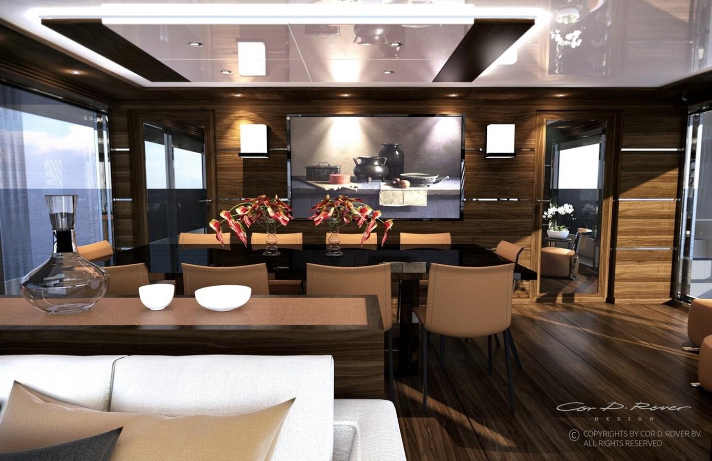 a room with a table and chairs aboard HORIZON FD125  Yacht for Sale