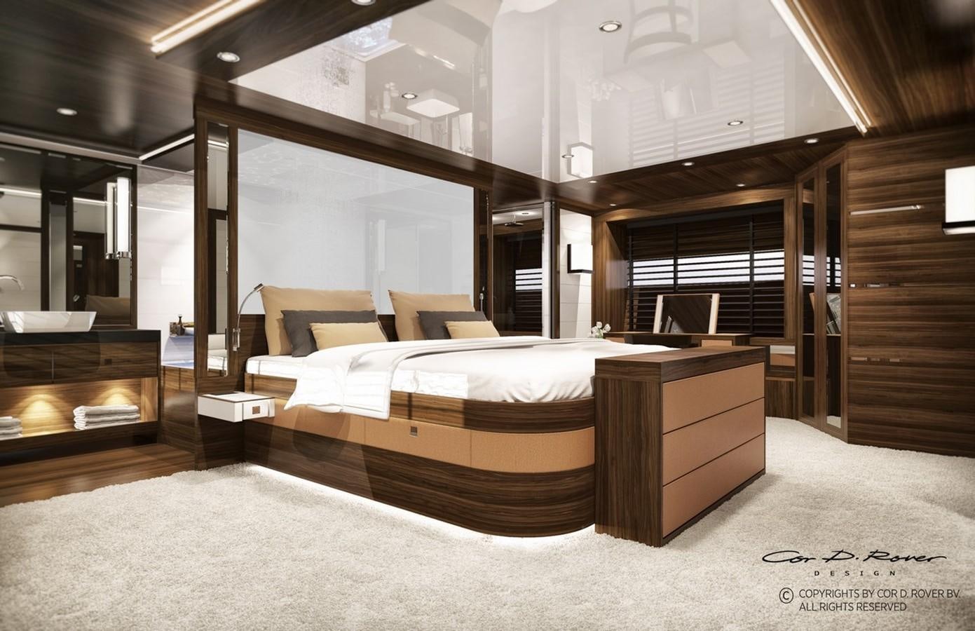 a room with a bed and a fireplace aboard HORIZON FD125  Yacht for Sale