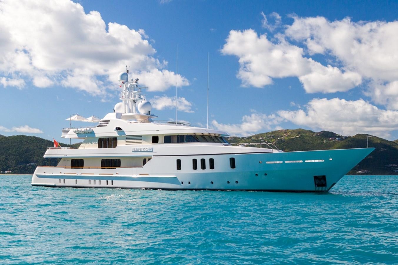 a white boat in the water aboard ADVENTURE Yacht for Sale