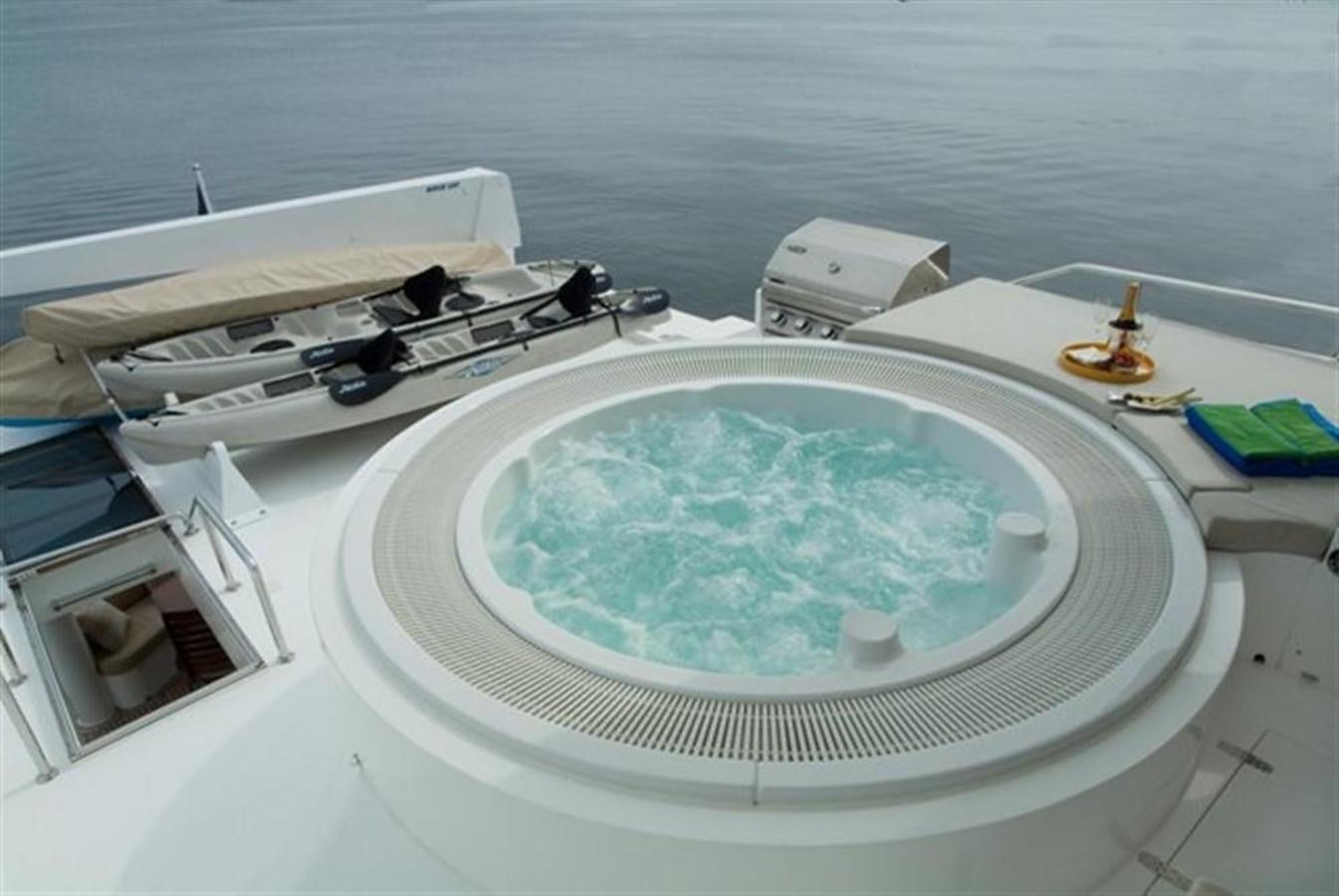 a white table with a pool aboard SEA LEGEND Yacht for Sale