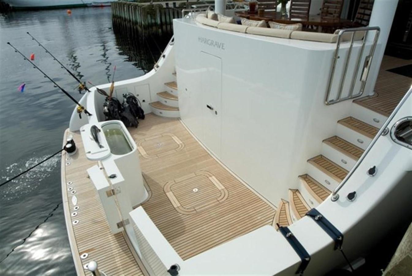 a boat with a large white boat on it aboard SEA LEGEND Yacht for Sale