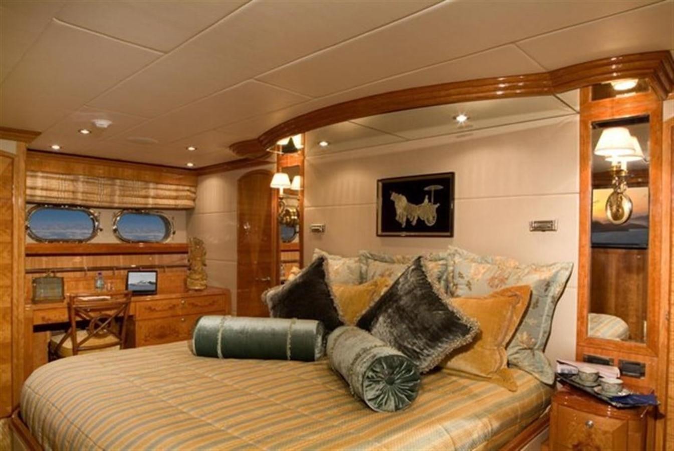 a large bed in a room aboard SEA LEGEND Yacht for Sale