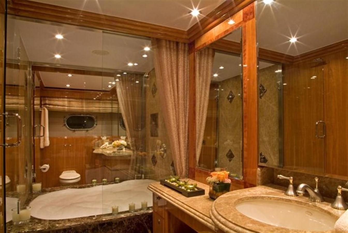 a bathroom with a large mirror aboard SEA LEGEND Yacht for Sale
