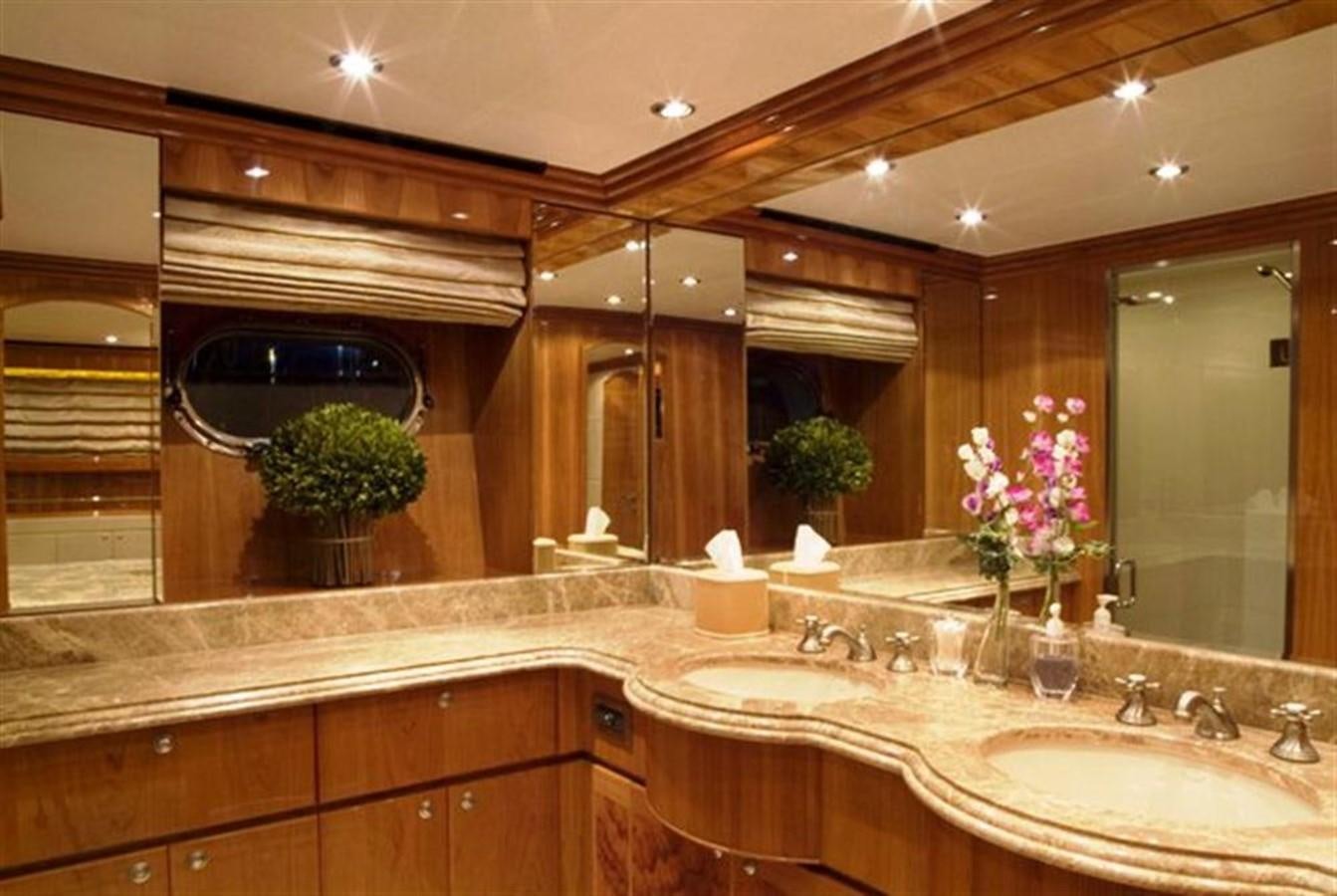 a bathroom with a large mirror aboard SEA LEGEND Yacht for Sale