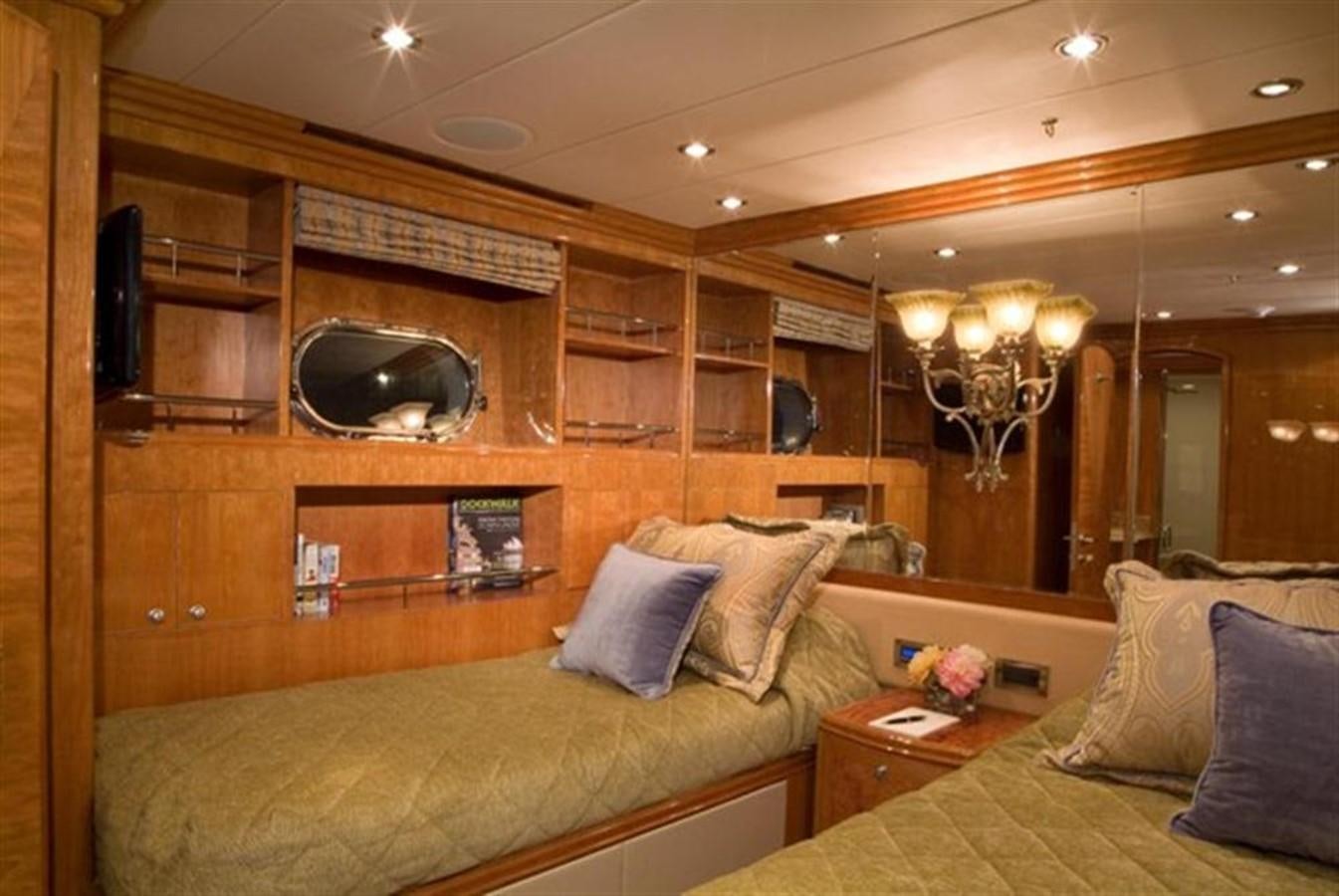 a bed in a room aboard SEA LEGEND Yacht for Sale