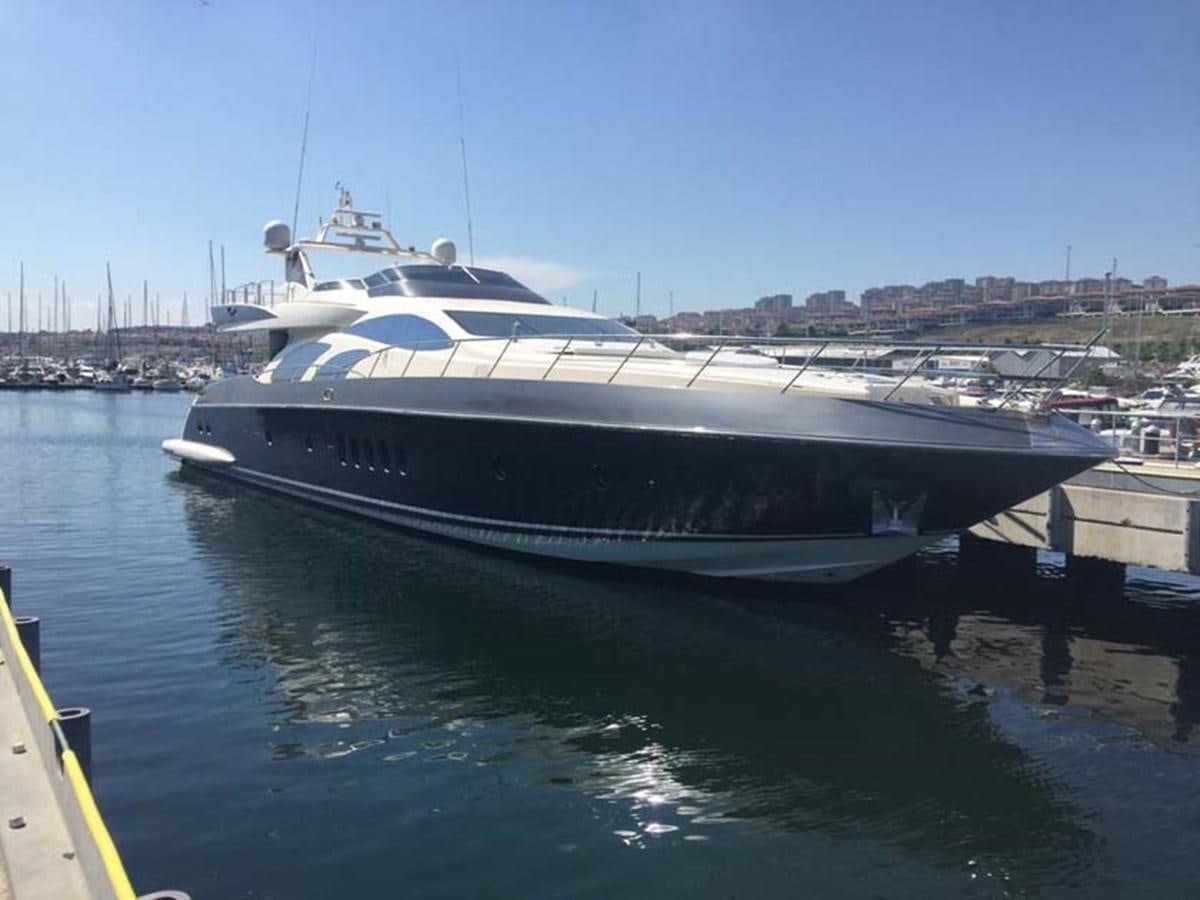 a boat docked at a pier aboard AEGINA Yacht for Sale