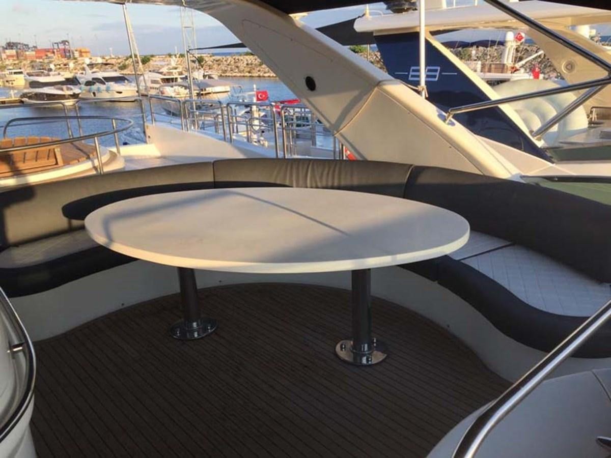 a table on a boat aboard AEGINA Yacht for Sale