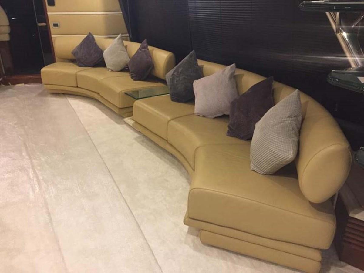 a couch with pillows aboard AEGINA Yacht for Sale