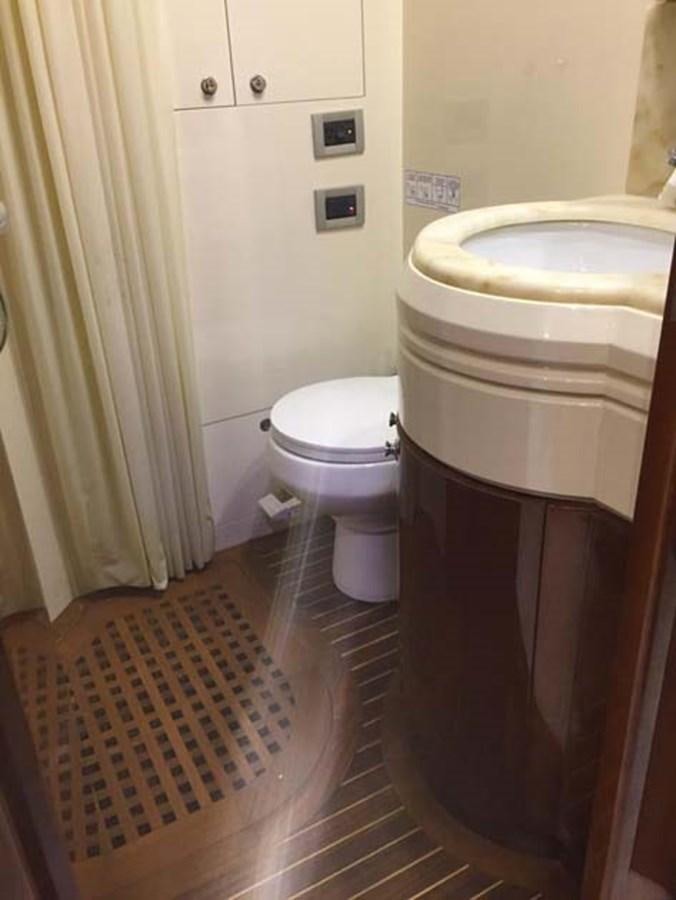 a bathroom with a rug aboard AEGINA Yacht for Sale