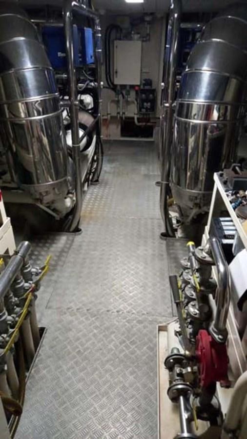 a room with several large metal pipes aboard AEGINA Yacht for Sale