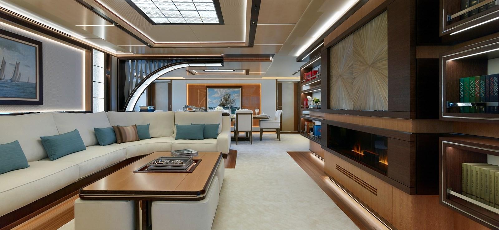 a living room with a fireplace aboard GAJA Yacht for Sale
