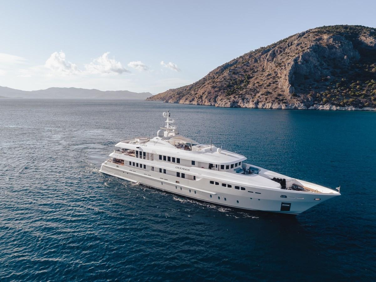 a white yacht in the water aboard OCEANOS Yacht for Sale
