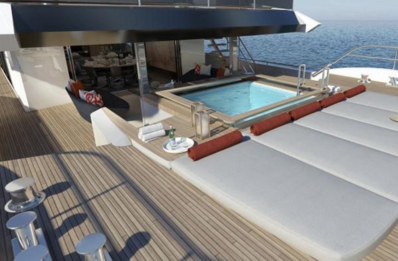 a deck with a pool and a deck and chairs on it aboard 50 METER OCEAN Yacht for Sale