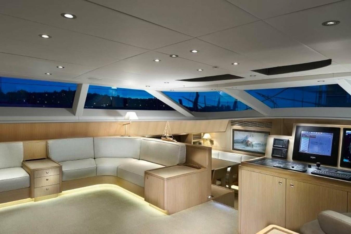 a room with a couch and a computer aboard IMAGINE D Yacht for Sale
