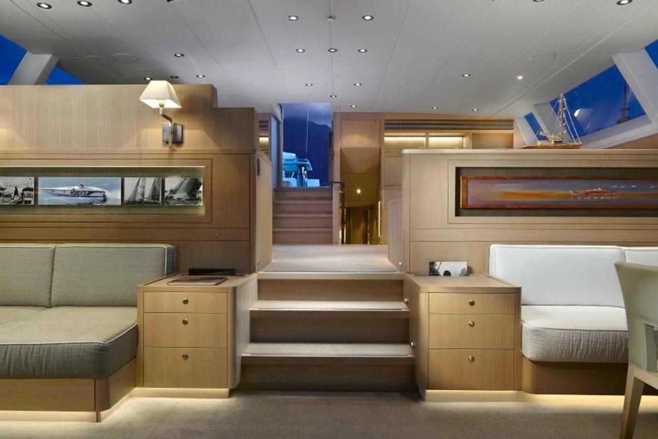 a room with a bed and a couch aboard IMAGINE D Yacht for Sale