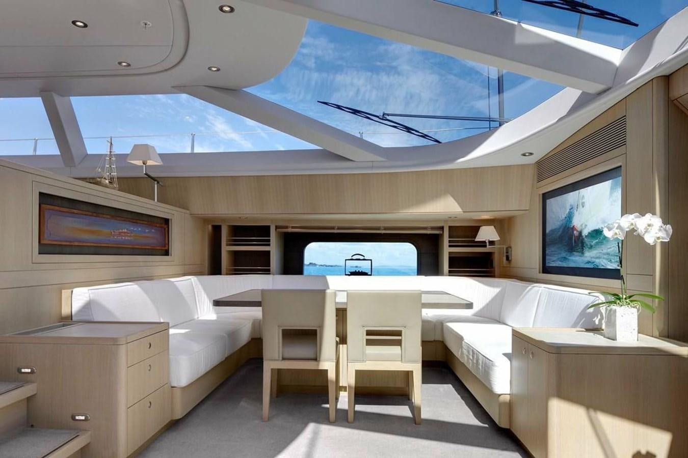 a room with a bed and a couch aboard IMAGINE D Yacht for Sale