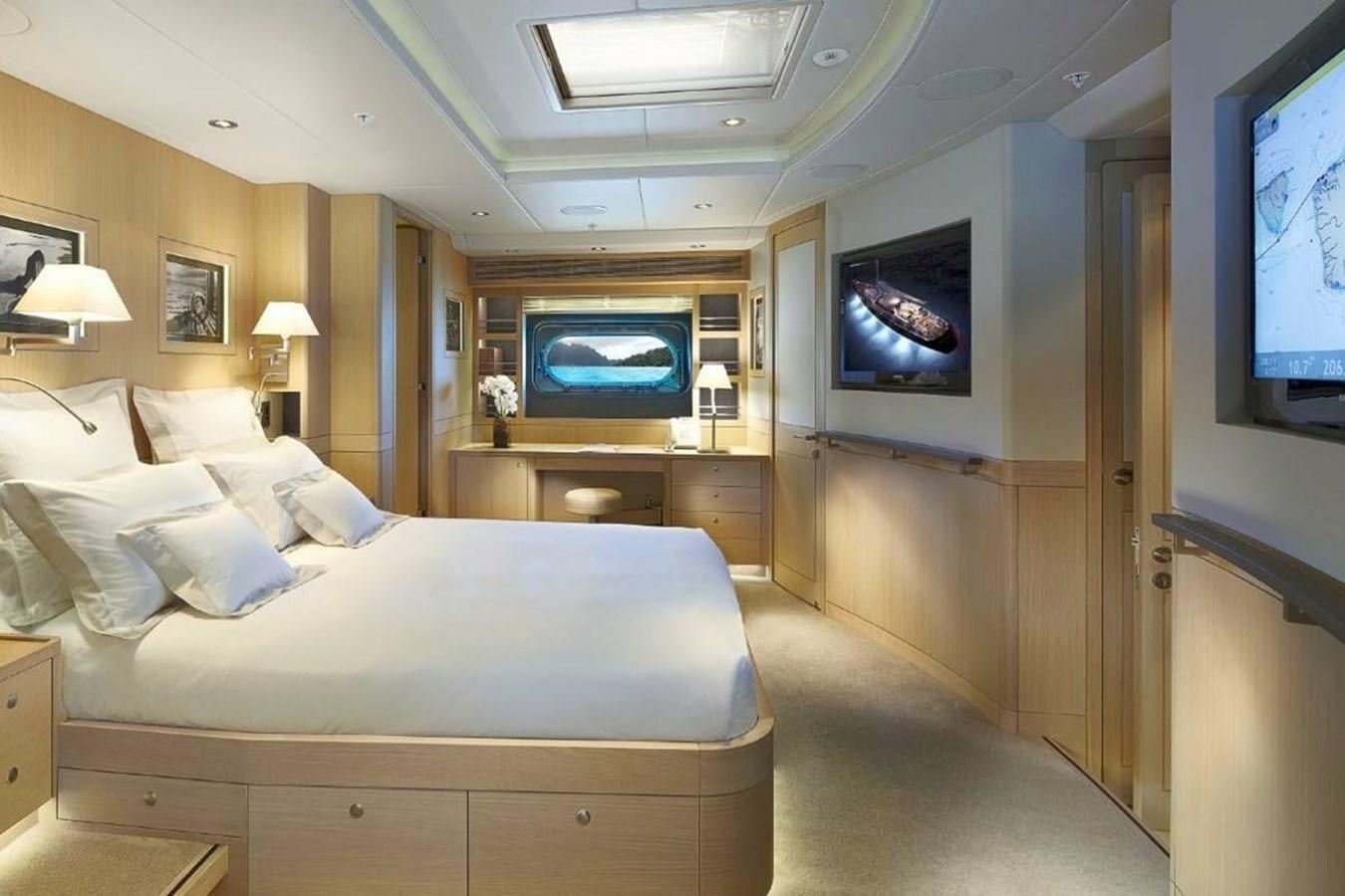 a hotel room with a bed aboard IMAGINE D Yacht for Sale