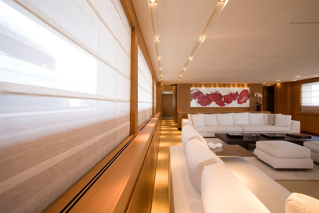 a room with a bed and a couch aboard QUEEN BLUE Yacht for Sale