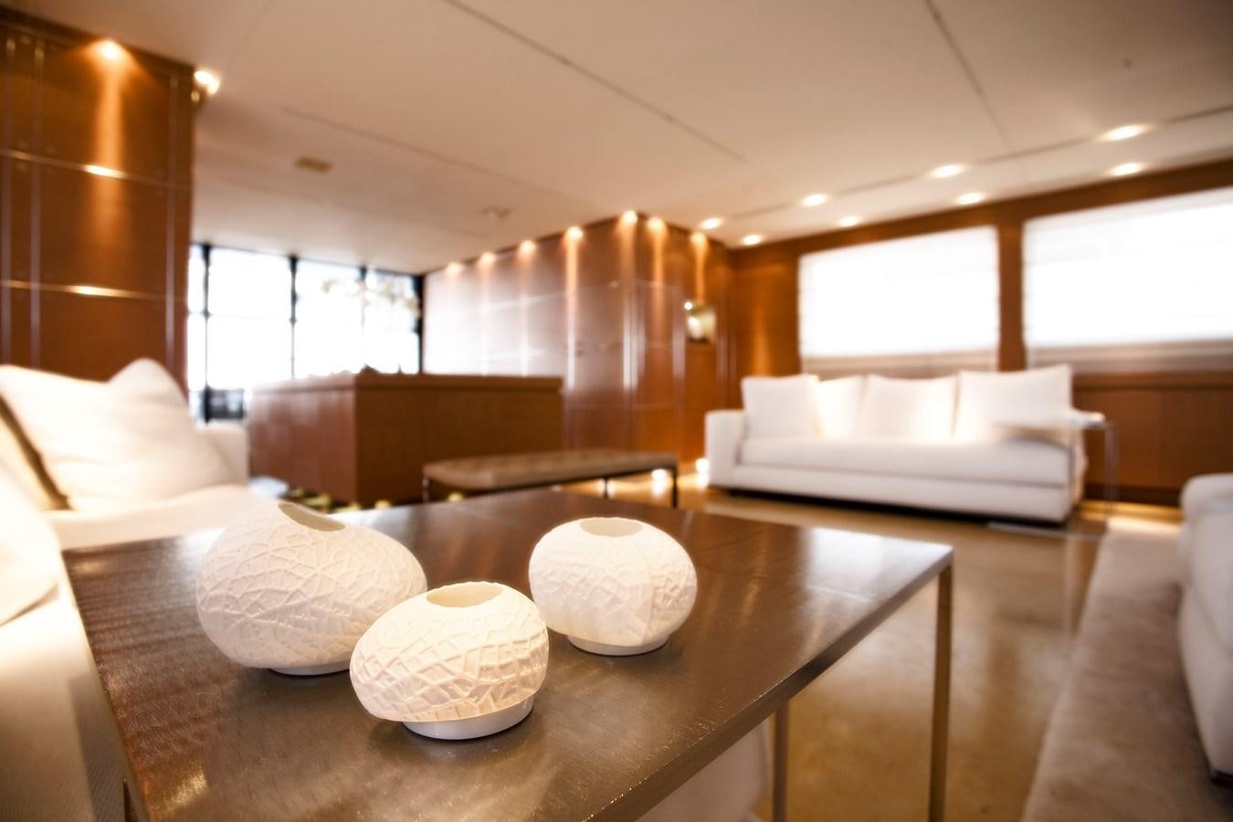 a room with a table and chairs aboard QUEEN BLUE Yacht for Sale