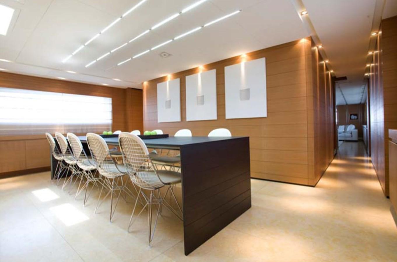 a conference room with tables and chairs aboard QUEEN BLUE Yacht for Sale