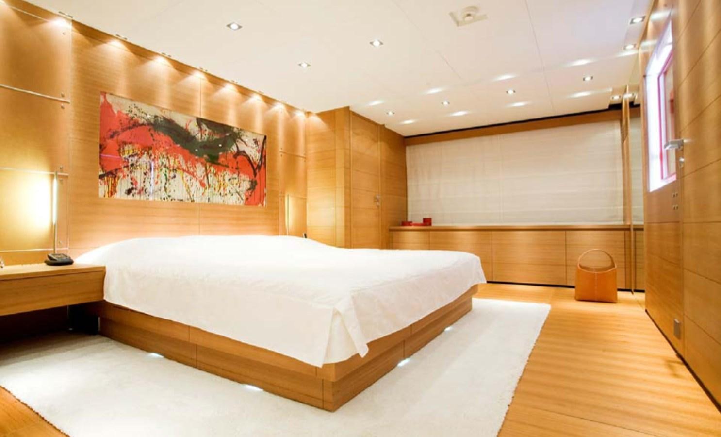 a large bedroom with a large bed aboard QUEEN BLUE Yacht for Sale