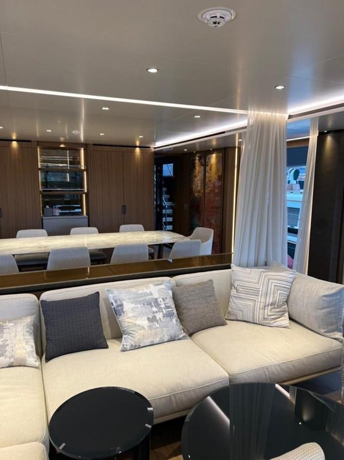 a living room with a couch and a table aboard RANDY BETH Yacht for Sale