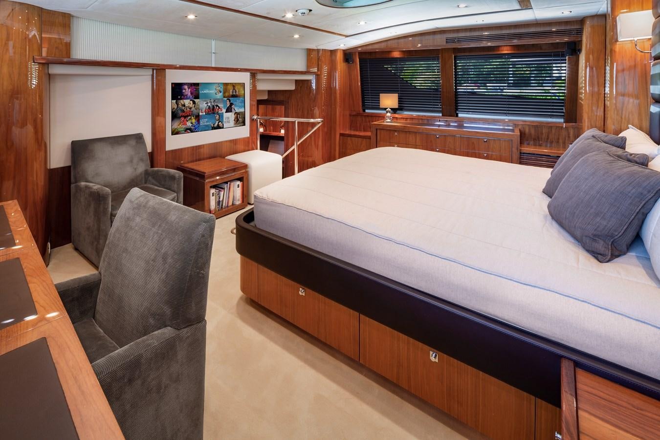 a bed in a room aboard 2010 SUNSEEKER 34M  @ AVENTURA FL Yacht for Sale
