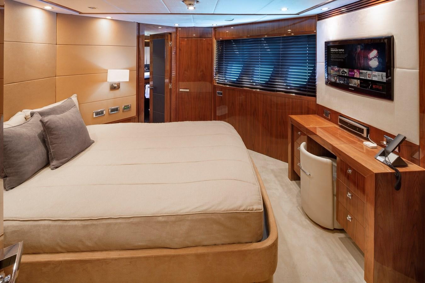 a bed in a room aboard 2010 SUNSEEKER 34M  @ AVENTURA FL Yacht for Sale