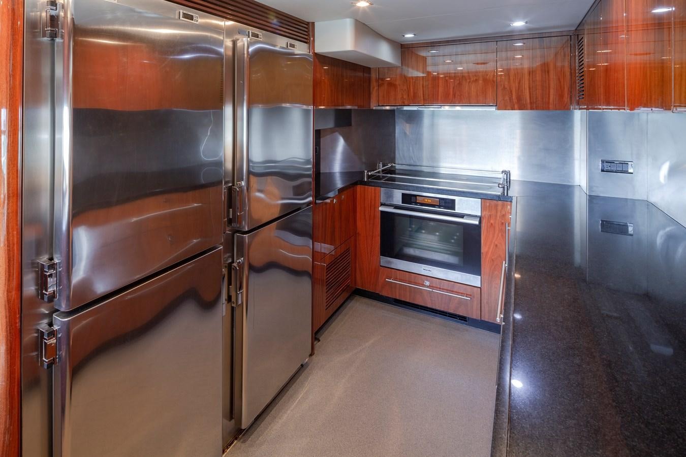 a large kitchen with stainless steel appliances aboard 2010 SUNSEEKER 34M  @ AVENTURA FL Yacht for Sale