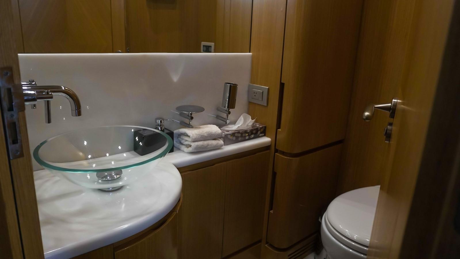 a bathroom with a sink and toilet aboard PETRUS Yacht for Sale