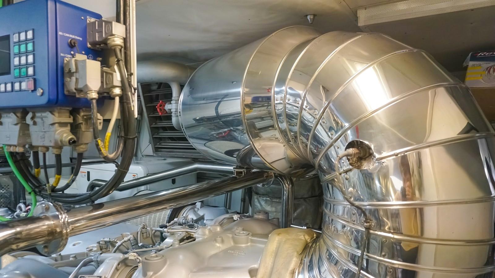 a person working in a factory aboard PETRUS Yacht for Sale