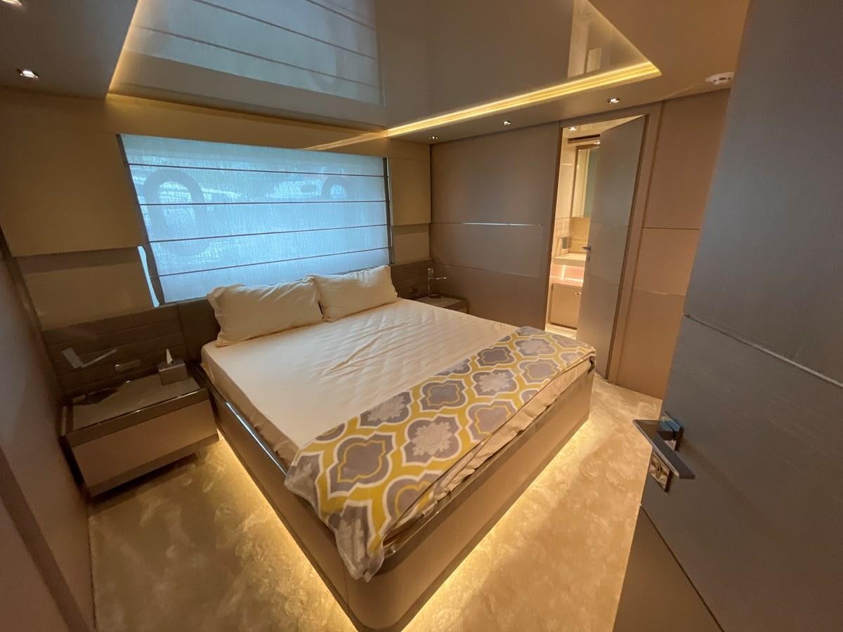 a bed in a room aboard CUSTOM LINE 108 Yacht for Sale