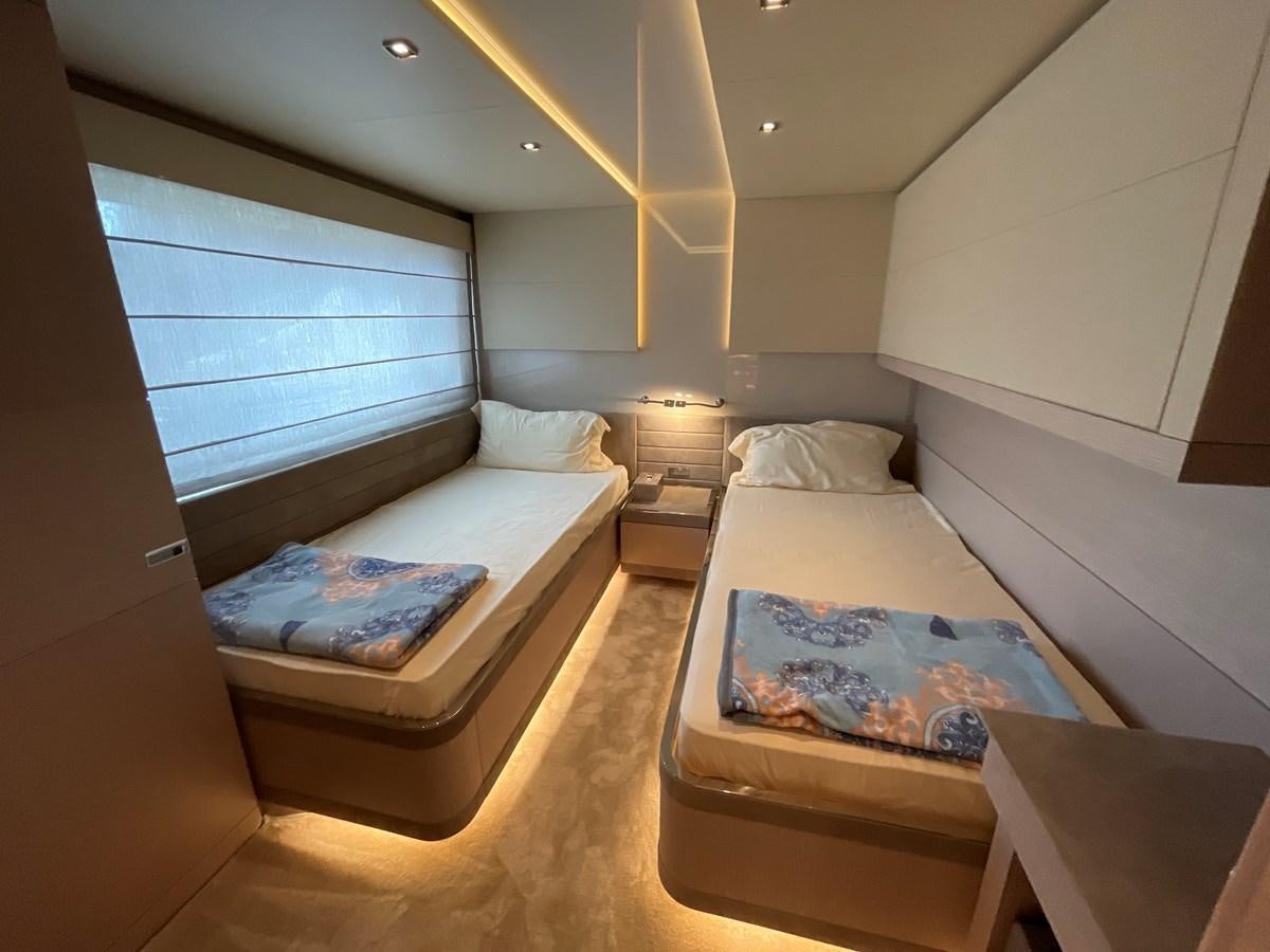 a room with two beds aboard CUSTOM LINE 108 Yacht for Sale