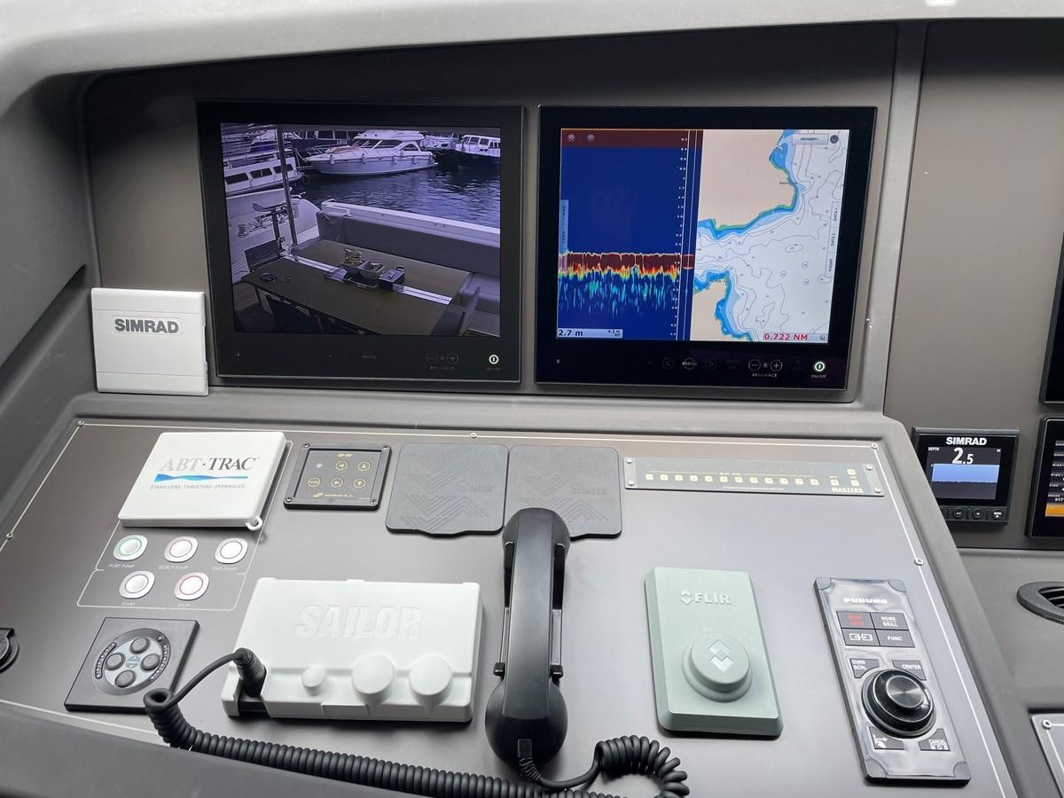 a video game console with a game controller and a game console aboard CUSTOM LINE 108 Yacht for Sale