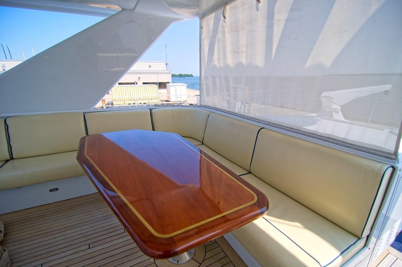 a blue and orange lounge chair on a deck aboard VICTORY Yacht for Sale