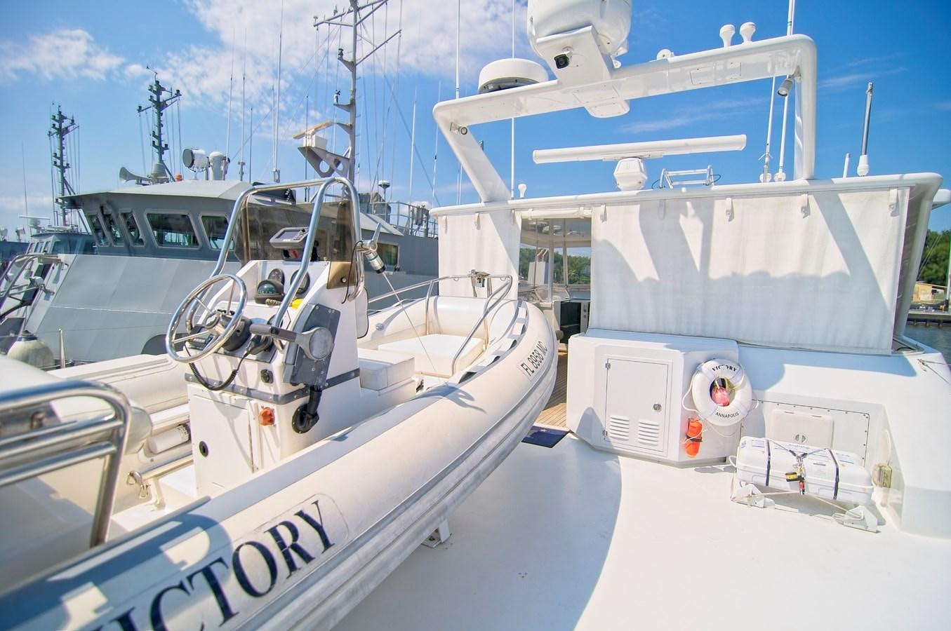 a group of boats on a dock aboard VICTORY Yacht for Sale