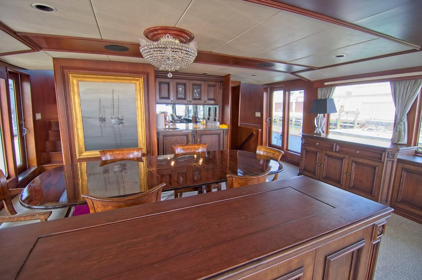 a large kitchen with a large island aboard VICTORY Yacht for Sale