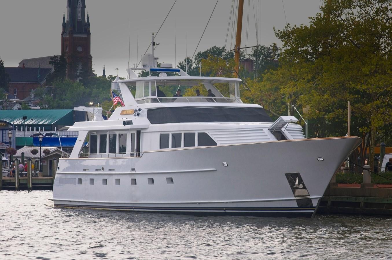 a large white boat aboard VICTORY Yacht for Sale