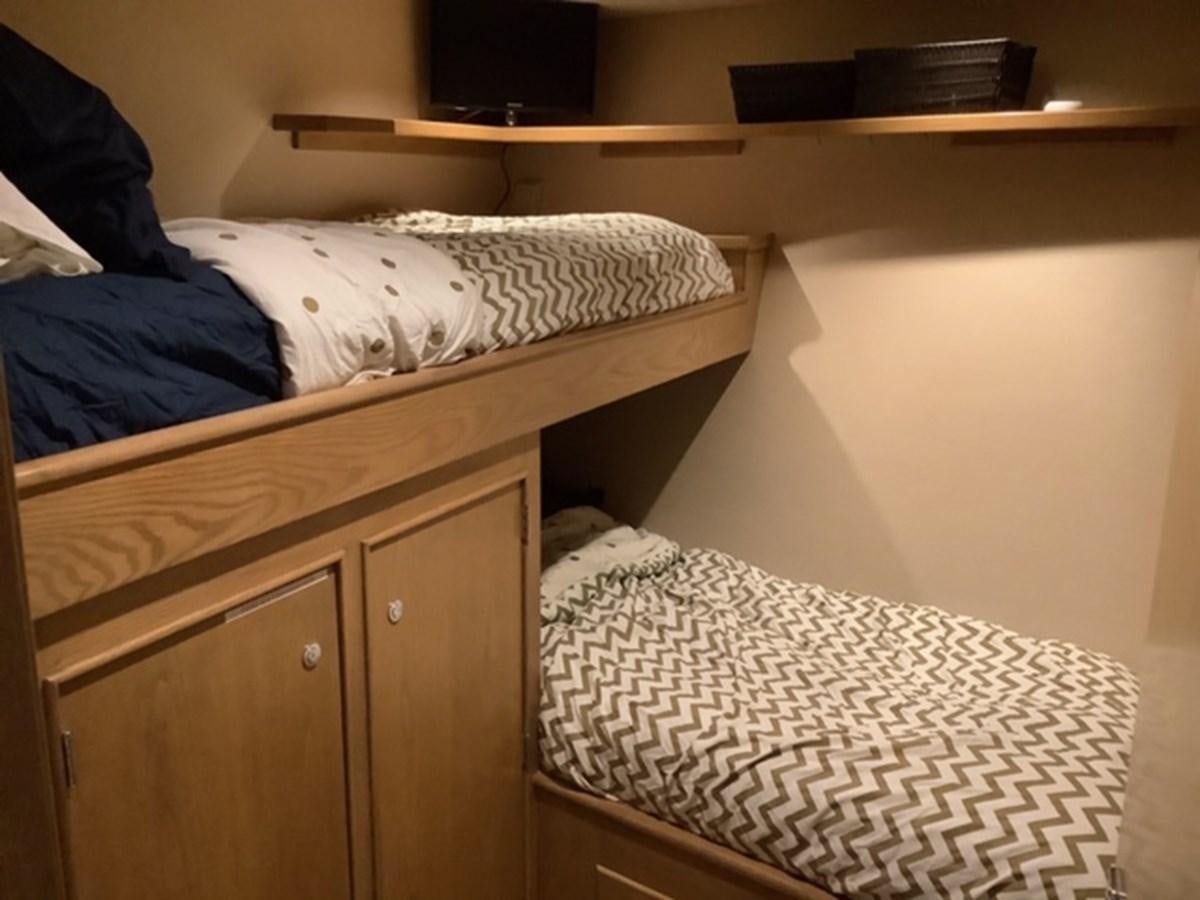 a couple of beds in a room aboard VICTORY Yacht for Sale