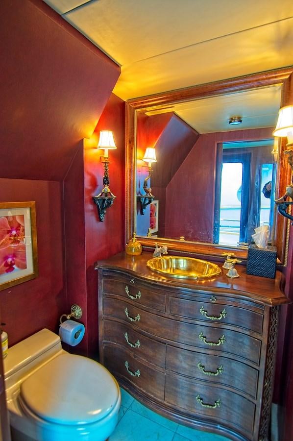 a bathroom with a sink and a toilet aboard VICTORY Yacht for Sale