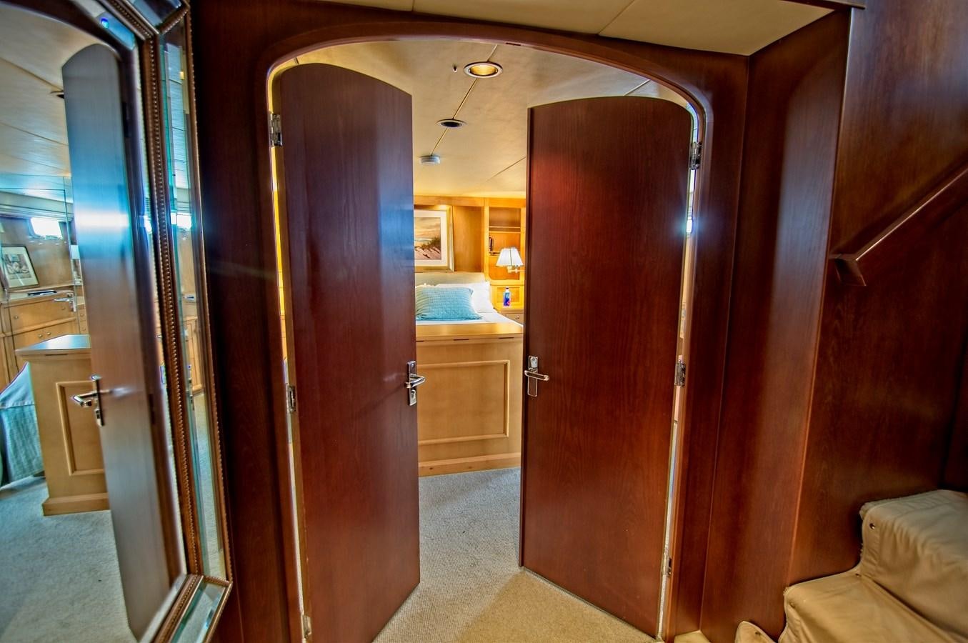 a room with a wood door aboard VICTORY Yacht for Sale