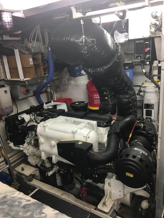 a car with a large engine aboard VICTORY Yacht for Sale