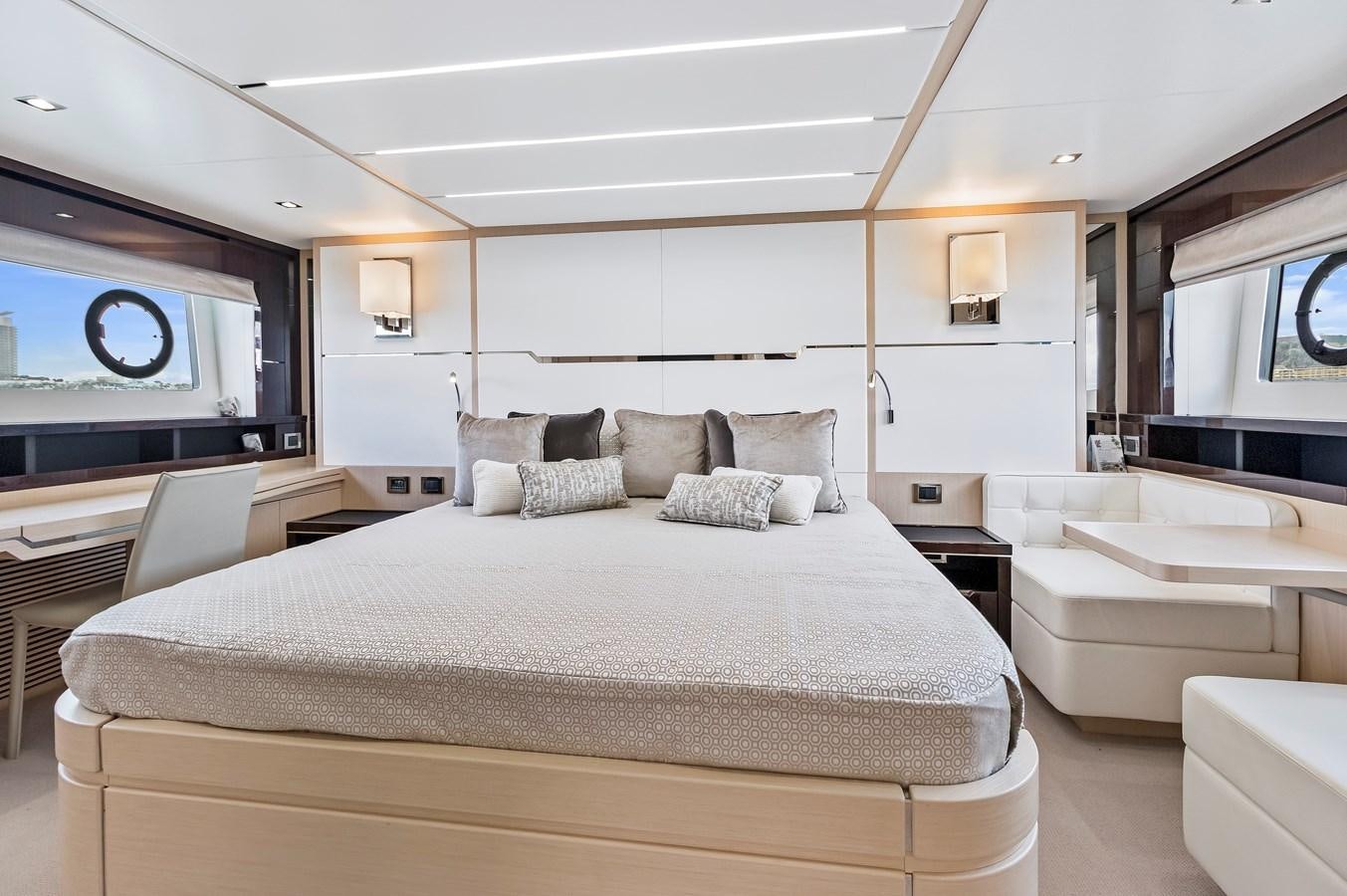 a large bedroom with a large bed aboard SUNSEEKER PREDATOR Yacht for Sale